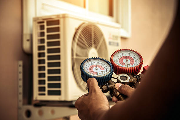 Professional Air Conditioning Service technician working in Cunningham, KY